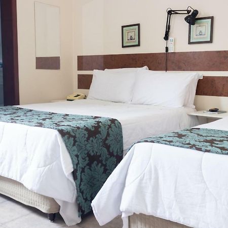 Hotel Minastur กาปีตอลิโอ ภายนอก รูปภาพ